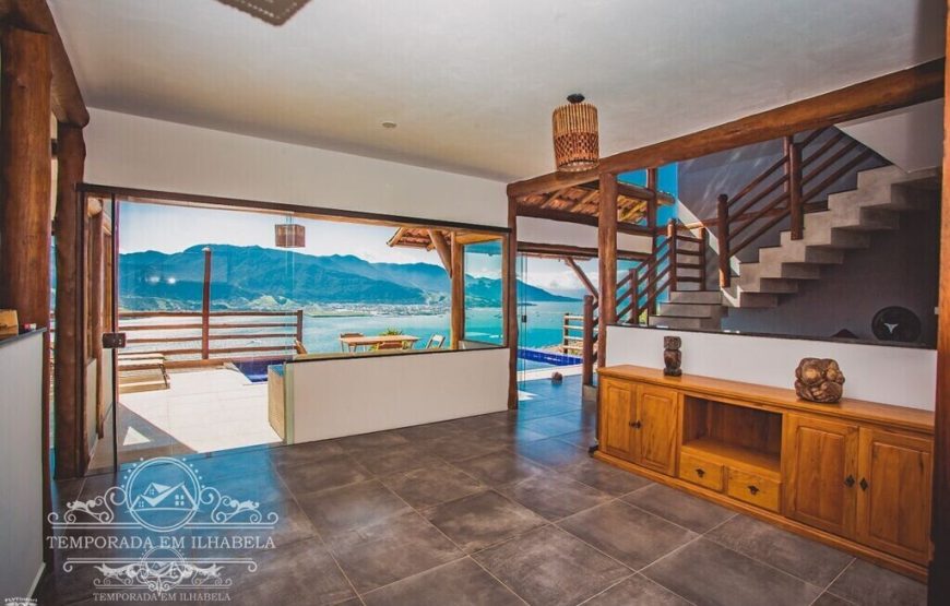 Linda casa com vista panorâmica e piscina de borda infinita – Casa Piuva